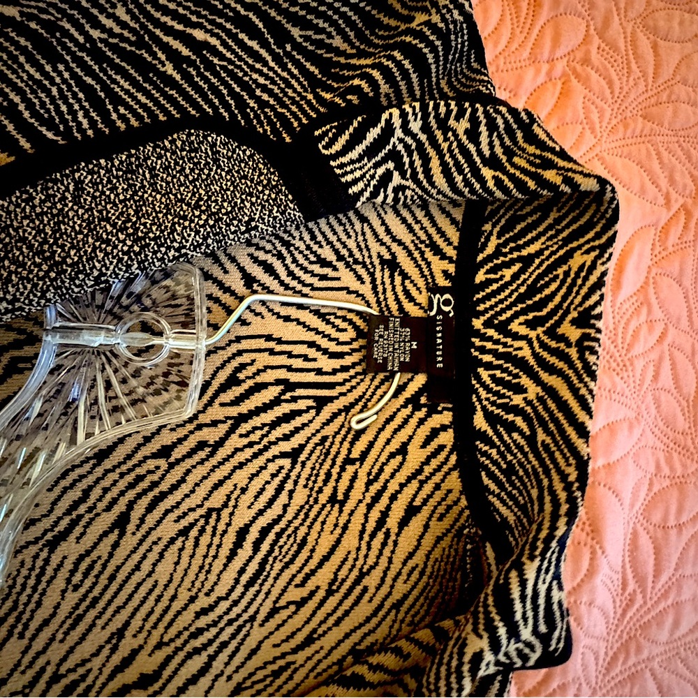 Animal print knit suit.